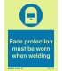 5735 Face protection must be worn when welding + symbol